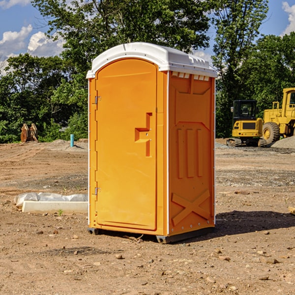 how often are the portable restrooms cleaned and serviced during a rental period in Lawrence Michigan